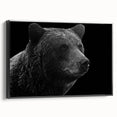 Framed canvas wall art showcasing a striking black bear design, set against a minimalist background, perfect for wildlife-themed decor in modern interiors.
