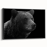 Framed canvas wall art showcasing a striking black bear design, set against a minimalist background, perfect for wildlife-themed decor in modern interiors.