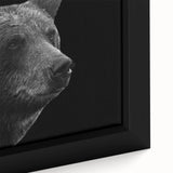 Close-up of a framed canvas wall art featuring a striking black bear design, showcasing intricate details and vibrant colors, perfect for wildlife enthusiasts and home decor.