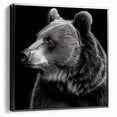 Framed canvas wall art featuring a striking black bear design, showcasing intricate details and textures, perfect for nature-themed home decor in a modern setting.