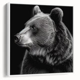 Framed canvas wall art showcasing a black bear design, featuring a sleek white frame and side view that highlights its modern aesthetic, perfect for wildlife enthusiasts.