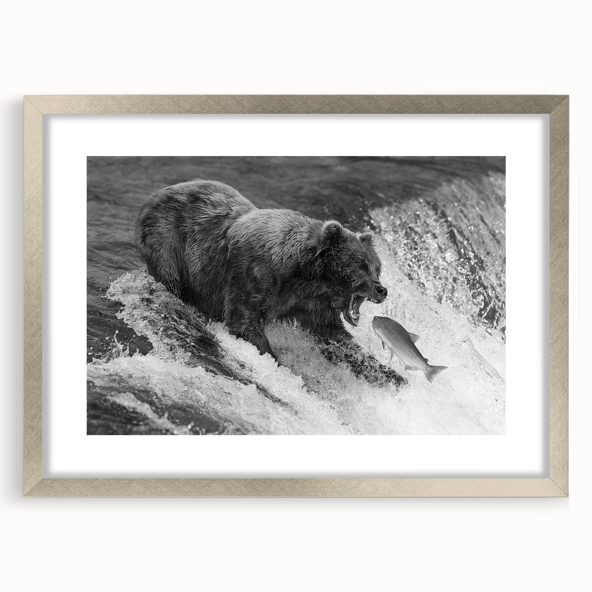 Framed wall art featuring a detailed black bear design, set in a silver frame with matting, perfect for nature-themed home decor. Ideal for wildlife enthusiasts.