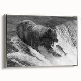 Framed canvas wall art showcasing a striking black bear design, elegantly bordered in silver, perfect for wildlife-themed decor, highlighting nature's beauty.