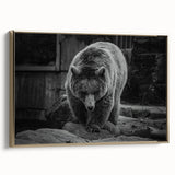 Framed canvas wall art showcasing a black bear design with gold accents, highlighting its intricate details and contemporary style, perfect for wildlife enthusiasts.