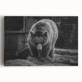 Black bear wall art design on stretched canvas, showcasing detailed fur texture and natural colors, perfect for nature-themed decor in homes or offices.