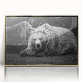 Framed wall art featuring a black bear design, showcasing intricate details and a gold-acrylic finish, perfect for nature-inspired home decor.