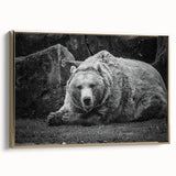 Framed canvas wall art featuring a striking black bear design with a gold frame, showcasing intricate details and textures, perfect for nature-themed decor.