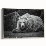 Framed wall art showcasing a stunning black bear design on canvas, featuring a sleek silver frame and side view display, perfect for nature-themed decor.