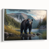 Framed wall art showcasing a striking black bear design on textured canvas, displayed in a sleek white frame, ideal for wildlife-themed home decor.