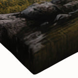 Close-up of a stretched canvas wall art featuring a black bear design, showcasing intricate details and vibrant colors, perfect for nature-inspired decor.