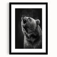 Framed black bear wall art design in a sleek black frame with a white mat, showcasing a striking wildlife illustration that enhances modern home decor.