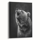 Framed wall art showcasing a striking black bear design on canvas, displayed in a stylish black frame, perfect for nature enthusiasts and home decor.