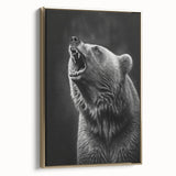 Framed wall art featuring a striking black bear design on canvas with a gold frame, showcasing detailed fur textures and a captivating side view. Perfect for wildlife enthusiasts and home decor.
