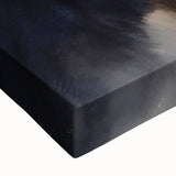 Close-up of a stretched canvas featuring a striking black bear design, showcasing detailed fur textures and vibrant colors, perfect for nature-themed wall art decor.