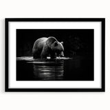 Black bear wall art framed with a mat, showcasing a striking design in a sleek black frame. Perfect for nature enthusiasts and home decor.