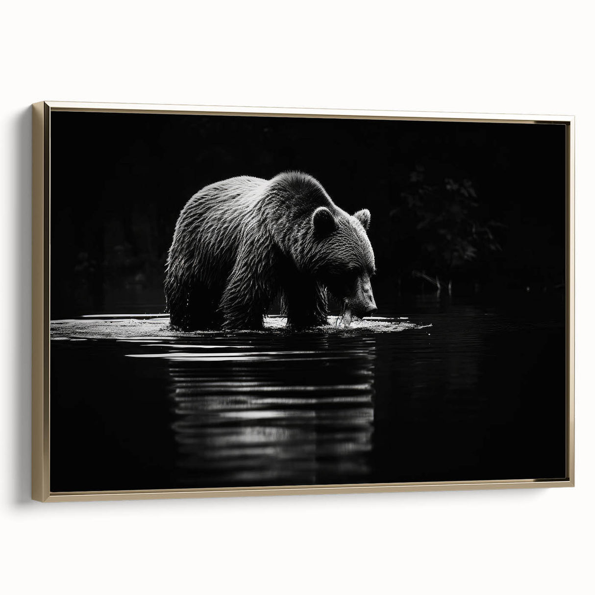 Framed wall art featuring a striking black bear design on canvas, showcased from the side with a gold frame, ideal for nature-themed home decor.
