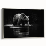 Framed canvas wall art showcasing a striking black bear design in a silver frame, highlighting intricate details and textures, perfect for nature lovers’ decor.