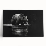 Stretched canvas wall art depicting a black bear in a natural setting, showcasing intricate details and textures, perfect for wildlife enthusiasts and home decor.