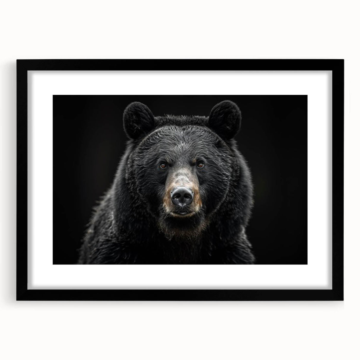 Framed wall art featuring a striking black bear design with a sleek black mat, perfect for enhancing modern home decor and nature-themed interiors.