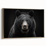 Framed canvas wall art showcasing a striking black bear design with gold accents, presented in an elegant side view, perfect for nature-themed decor.