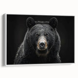 Framed canvas wall art featuring a striking black bear design, showcased in a sleek white frame. The side view highlights its modern aesthetic, perfect for nature-themed decor.