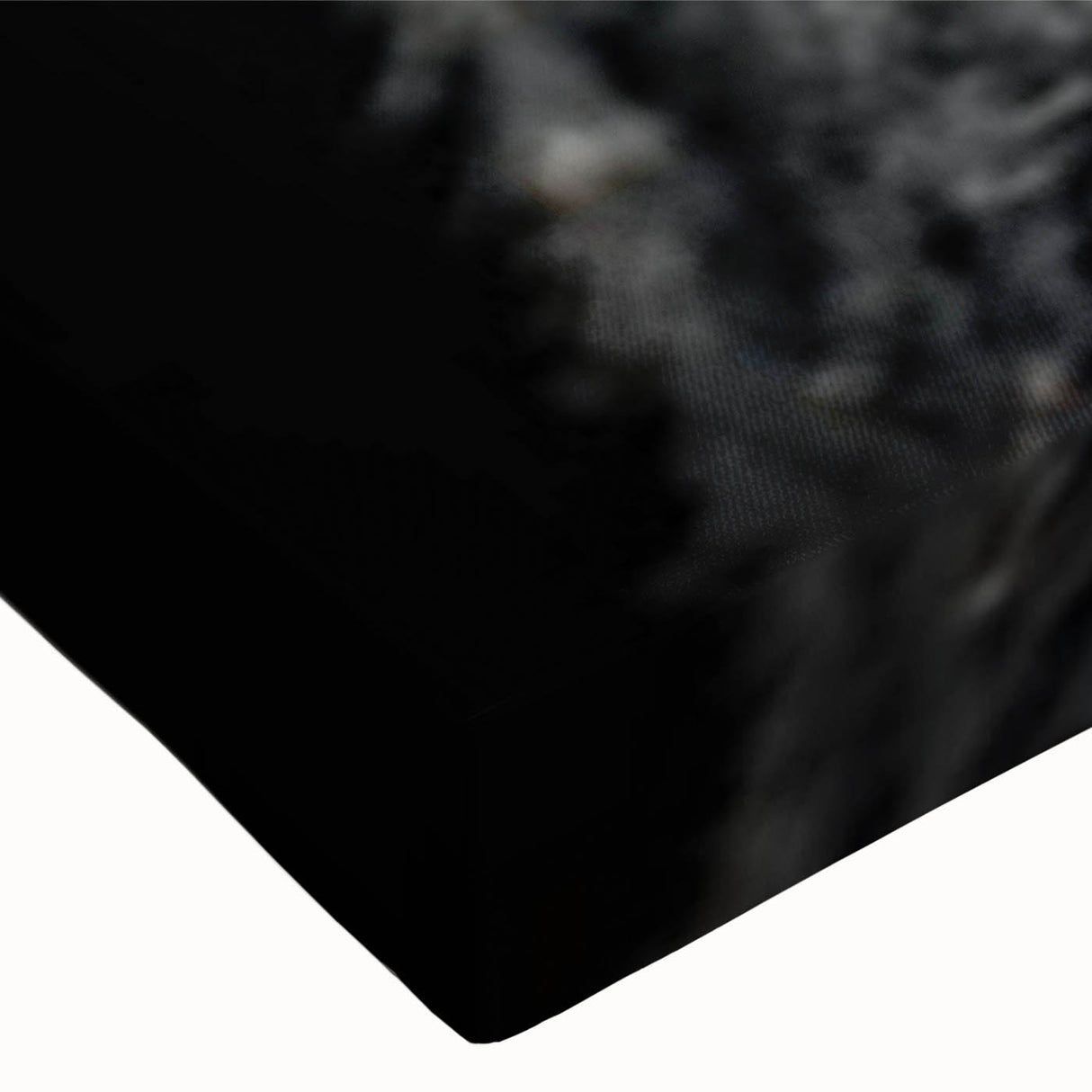 Close-up of a black bear wall art design on stretched canvas, showcasing detailed textures and deep colors, perfect for nature-themed decor.