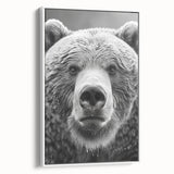 Framed wall art featuring a striking black bear design on canvas, set against a white background, showcasing rich colors and intricate details, ideal for nature enthusiasts.