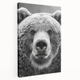 Stretched canvas wall art showcasing a striking black bear design in a natural setting, emphasizing bold colors and intricate details, perfect for wildlife enthusiasts.