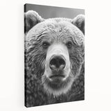 Stretched canvas wall art showcasing a striking black bear design in a natural setting, emphasizing bold colors and intricate details, perfect for wildlife enthusiasts.