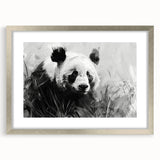 Framed wall art featuring a playful panda bear design set in a sleek silver frame with a mat, ideal for children's rooms or playful decor themes.
