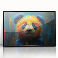 Framed acrylic wall art showcasing a playful panda bear design in a black frame, perfect for adding a whimsical touch to children's rooms or playful decor.