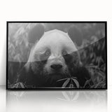 Framed acrylic wall art featuring a playful panda bear design, presented in a sleek black frame, perfect for children's rooms or playful decor.