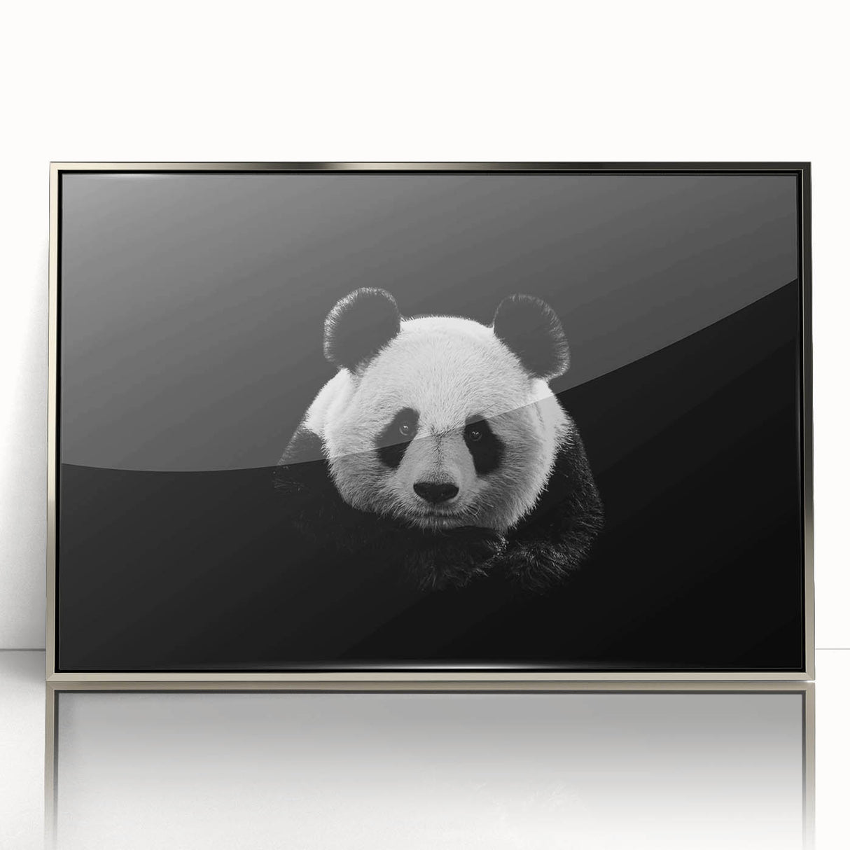 Framed acrylic wall art showcasing a playful panda bear design in vibrant colors, set against a sleek silver frame, perfect for modern home decor.