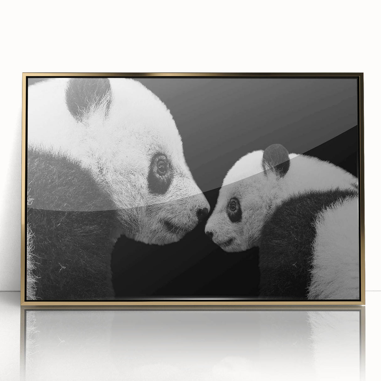 Framed wall art showcasing a playful panda bear design, featuring vibrant colors and a gold-accented frame, perfect for children's decor or animal lovers.