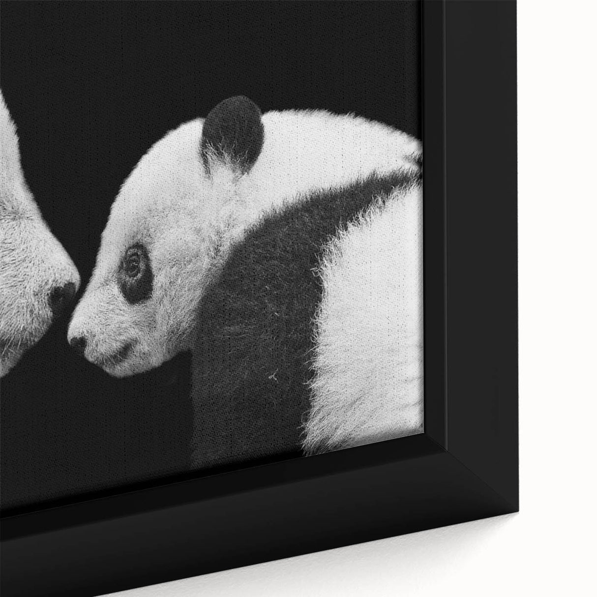 Close-up of a framed wall art piece featuring a whimsical panda bear design on canvas, showcasing vibrant colors and playful details, perfect for children's rooms.