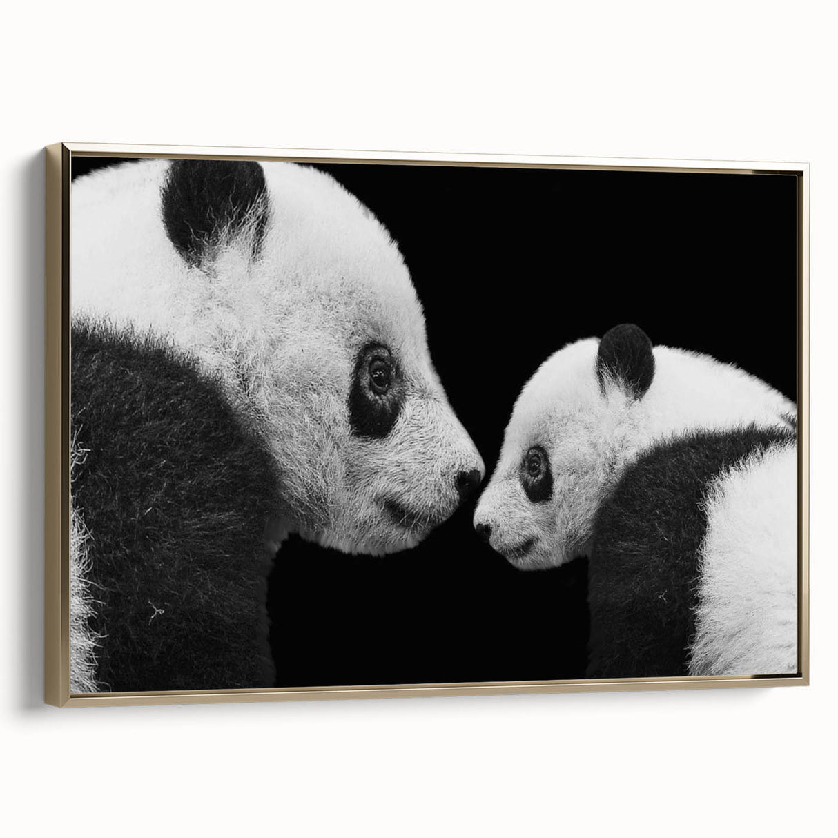 Framed wall art showcasing a stylish panda bear design on canvas, featuring a gold frame and a side view that highlights its elegance and vibrant colors. Perfect for adding a modern touch to any home decor.