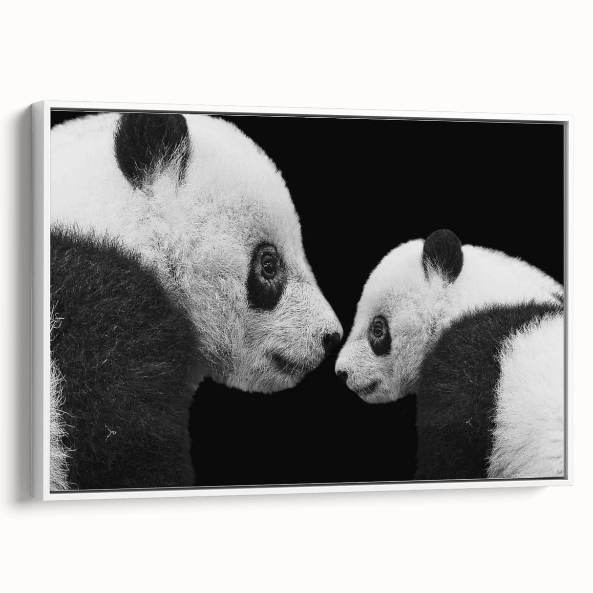 Framed canvas wall art featuring a playful panda bear design in vibrant colors, displayed from a side view against a white background, perfect for children's decor.
