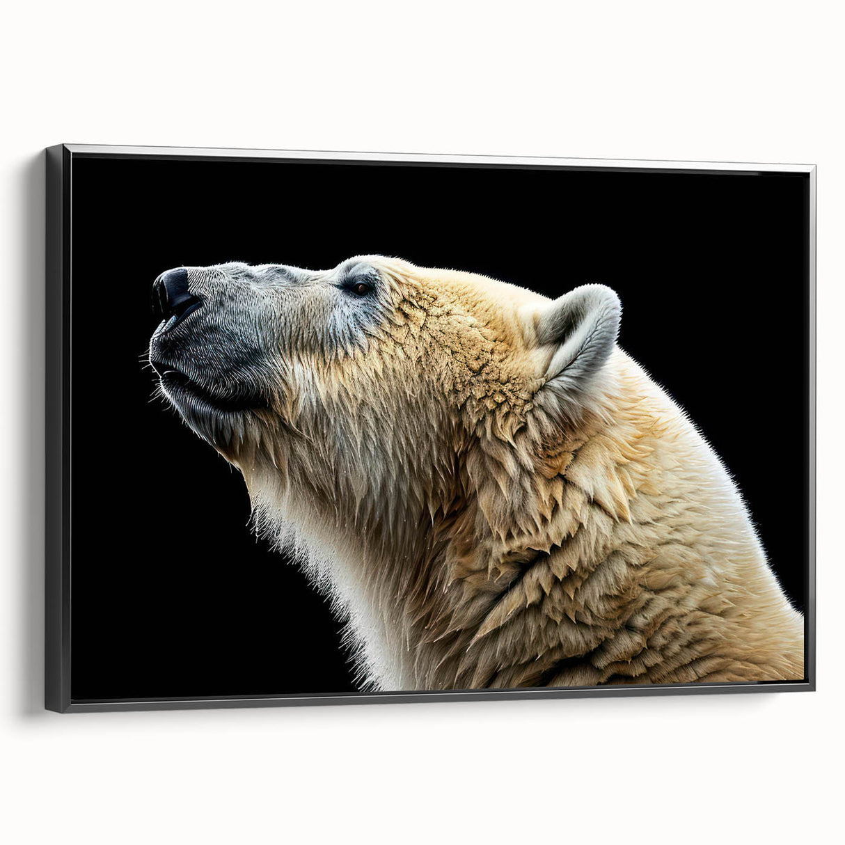 Framed canvas artwork showcasing a polar bear design in a minimalist black frame, ideal for modern home decor. The side view highlights the sleek edges and artistic details.