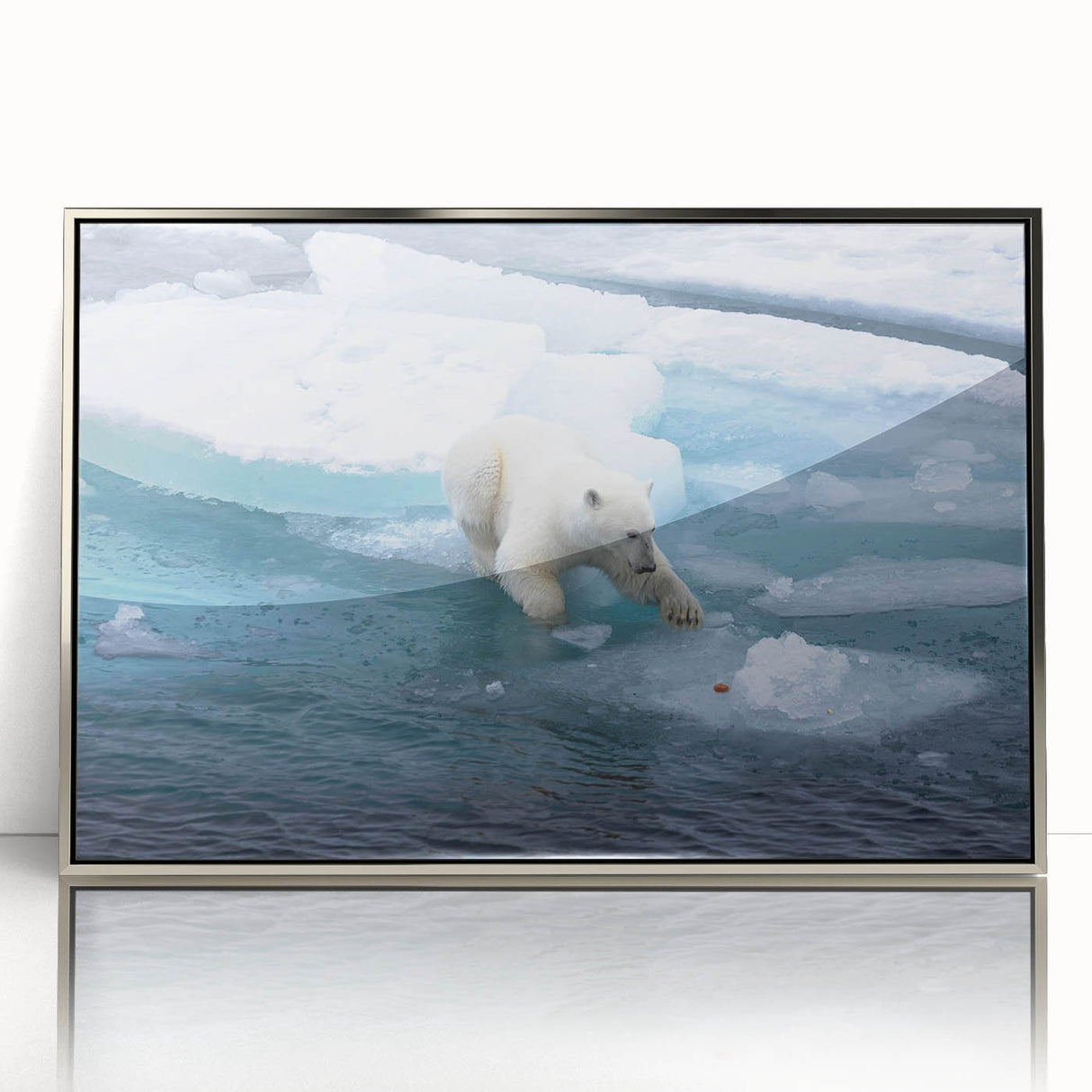 Framed wall art featuring a striking polar bear design set in a sleek silver frame, showcasing intricate details and vibrant colors, perfect for wildlife enthusiasts.