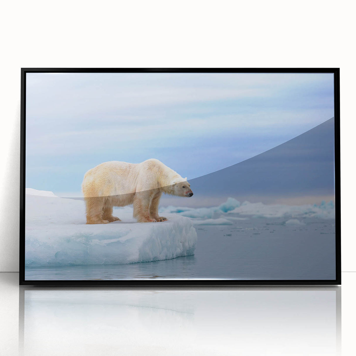 Framed wall art featuring a striking polar bear design in black and white, displayed in a sleek black frame, ideal for modern home decor and animal lovers.