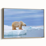 Framed wall art featuring a polar bear design on a textured canvas, elegantly displayed with a gold frame, ideal for adding a touch of nature to modern decor.
