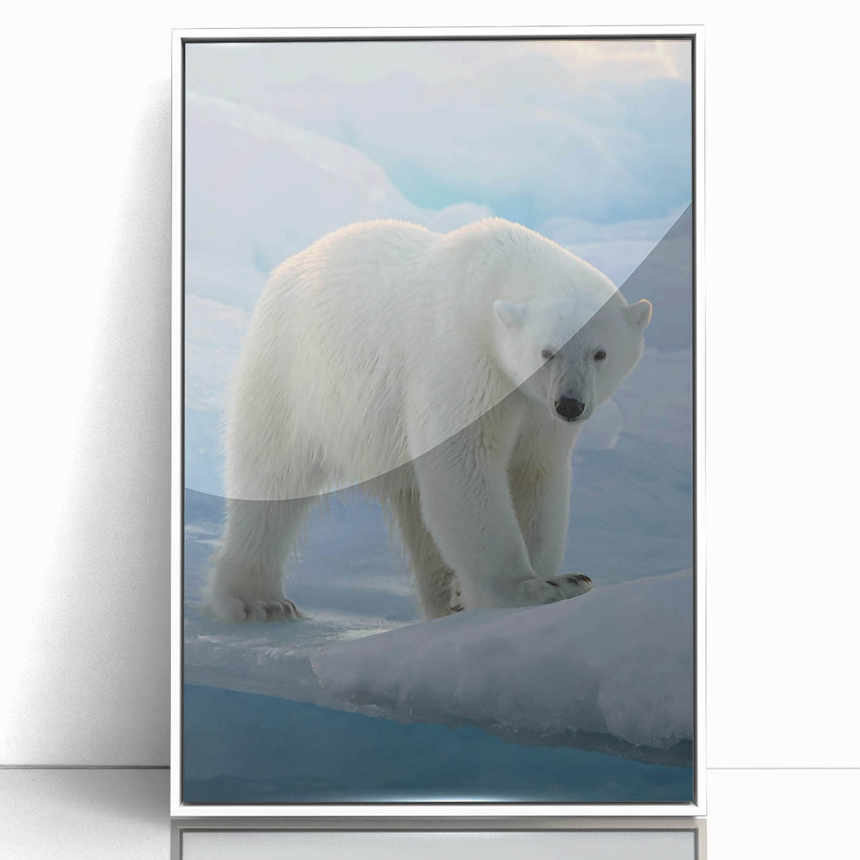 Framed wall art featuring a polar bear design in an acrylic finish, showcasing a white frame and a vibrant, detailed depiction of the bear in its natural habitat. Perfect for animal lovers and eco-conscious decor enthusiasts.