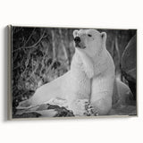 Framed wall art featuring a polar bear design on a textured canvas, elegantly displayed in a silver frame, perfect for wildlife and nature enthusiasts.