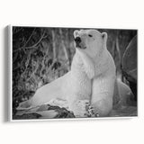Framed canvas wall art featuring a polar bear design, showcasing a white bear against a minimalist background, perfect for wildlife-themed decor. The artwork captures the essence of Arctic wildlife, making it an ideal addition to modern interiors.