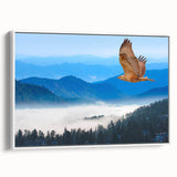 Framed canvas wall art showcasing a vibrant birds of prey design, featuring intricate details and a sleek white frame, perfect for enhancing any modern decor.