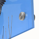 Close-up of a vibrant acrylic glass wall art piece featuring colorful birds in a dynamic design, showcasing intricate details and vivid hues against a neutral background. Ideal for nature enthusiasts looking to enhance their decor with a touch of wildlife-inspired artistry.