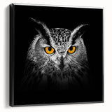 Framed canvas wall art showcasing a vibrant birds-of-prey design, featuring rich colors and intricate details, viewed from the side against a neutral background.