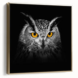 Framed canvas wall art featuring a vibrant birds of prey design, showcasing intricate details in gold tones, set against a neutral background for a striking visual impact.