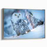 Framed wall art showcasing a striking birds of prey design with intricate details, set against a silver frame, perfect for enhancing modern decor.