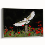 Framed canvas wall art featuring a silver side view of a bird design from the "Birds of Pray" collection, showcasing intricate details and vibrant colors, perfect for modern decor.